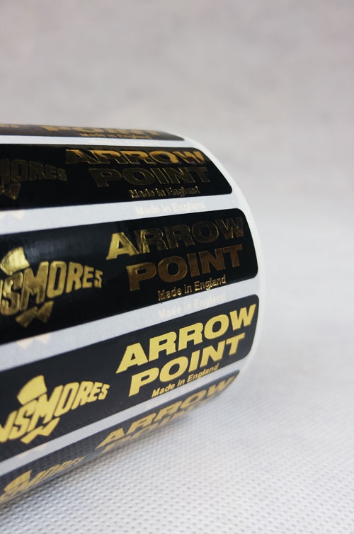 Foil Blocked Labels On Black Print: